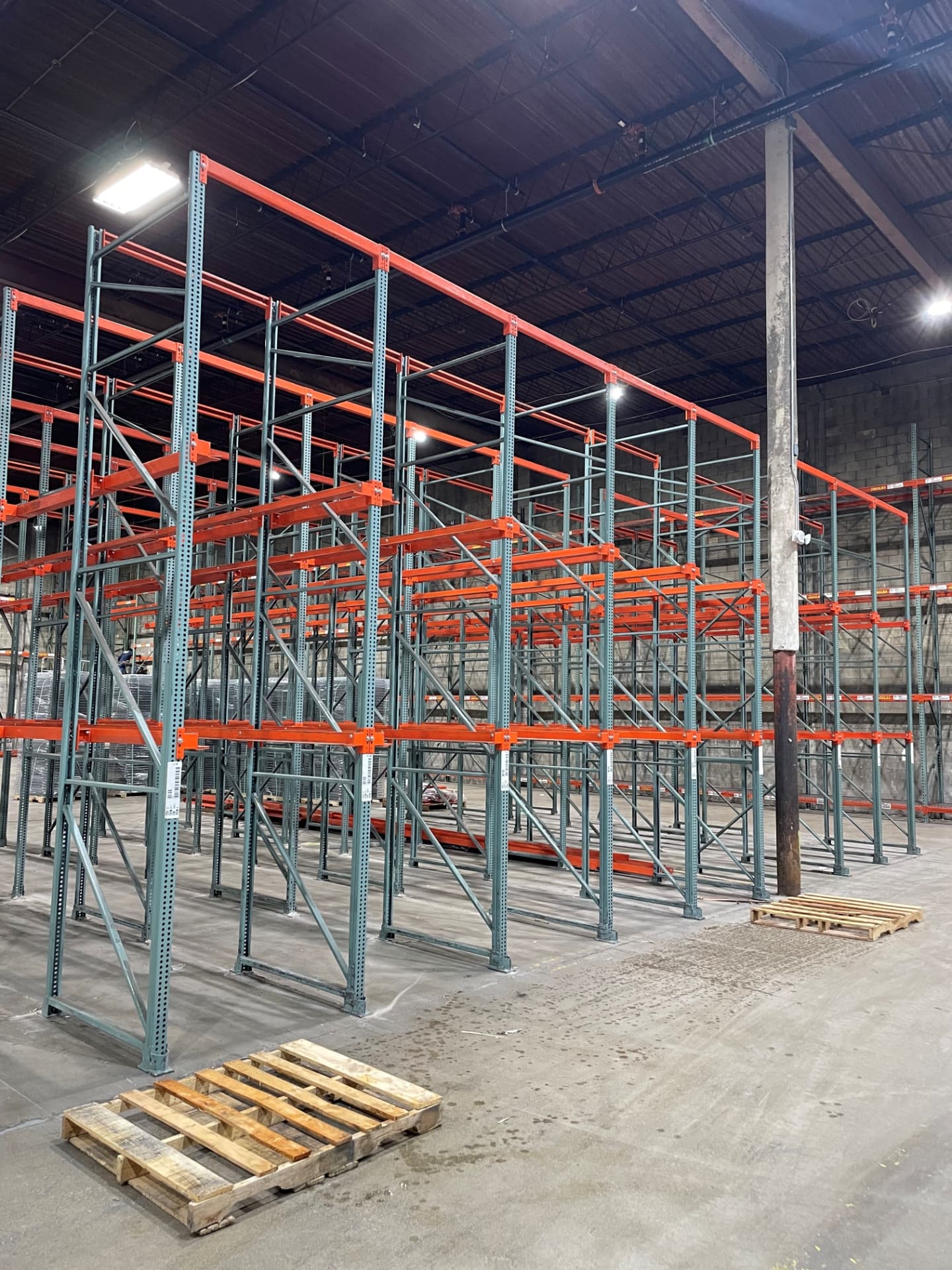 Drive-in pallet rack system installed in a warehouse